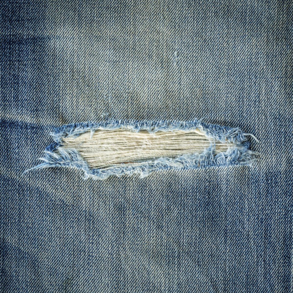 How to Fray and Distress Jeans with Scissors and Sandpaper